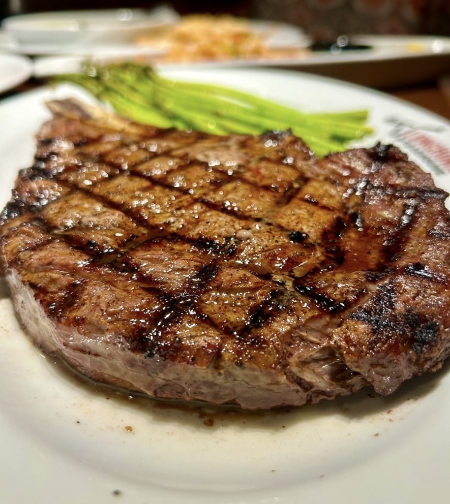 A 20-ounce, bone-in ribeye with charred crust, juicy marbling, and just the right amount of drama—Longhorn knows how to do steak night right.