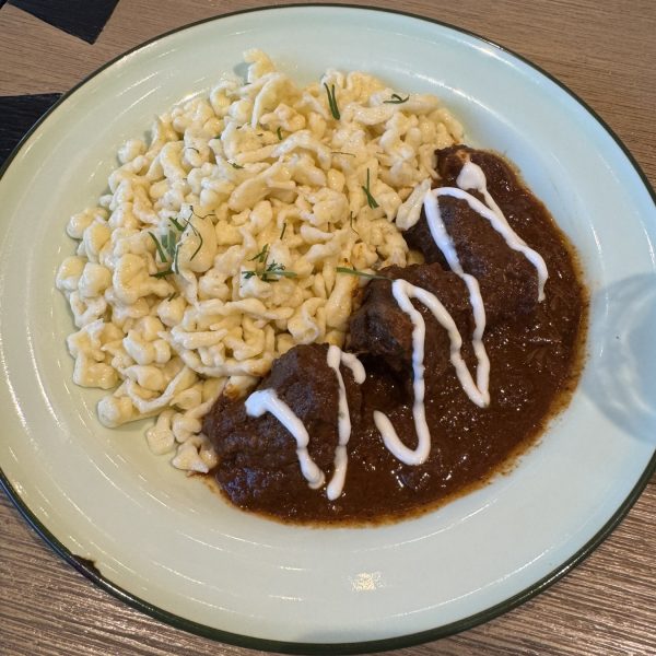 Cozy on a Plate:Tender beef goulash meets buttery spätzle—comfort food that feels like a warm hug from the Alps.