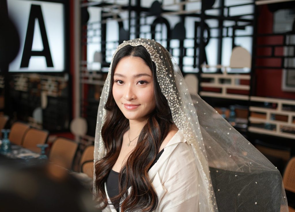 Close-up of Filipina bride Christiana Caballes wearing natural bridal makeup with bronzed tones and soft glam, styled by Cairo Manta