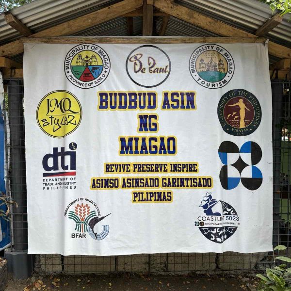 A banner hangs outside Lorlie’s salt cottage, lined with the logos of groups that believed in her work. For her, that recognition is more than enough—it’s a quiet push to keep going.