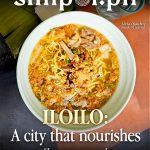 A warm bowl of molo soup on a wooden table, representing the culinary heritage. Iloilo UNESCO Gastronomy City chefs and food community celebrated in 2023