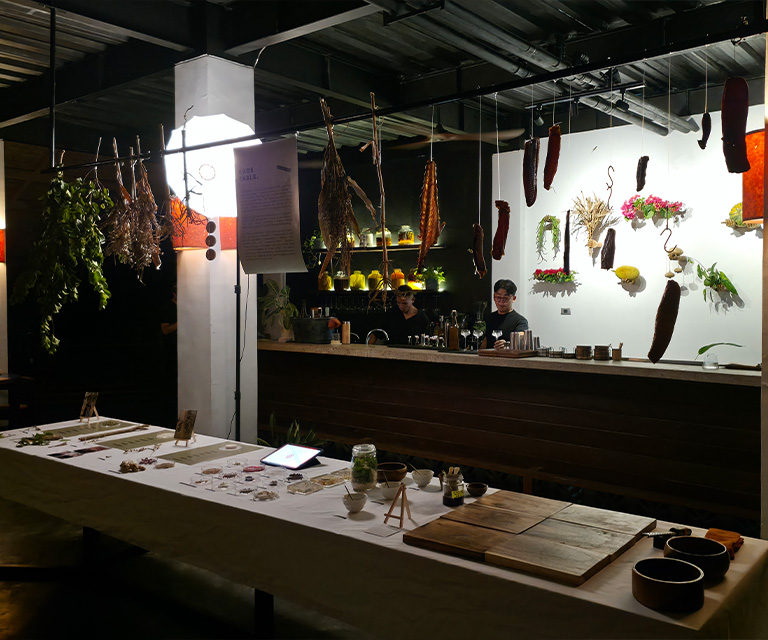Kaos Table at Roots with adlai dough, inyam, bubod, and seafood displayed at the Siargao Food and Wine Festival.